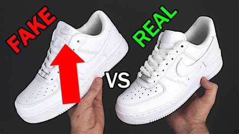 how to spot fake clothes shoes|false nike shoe labels.